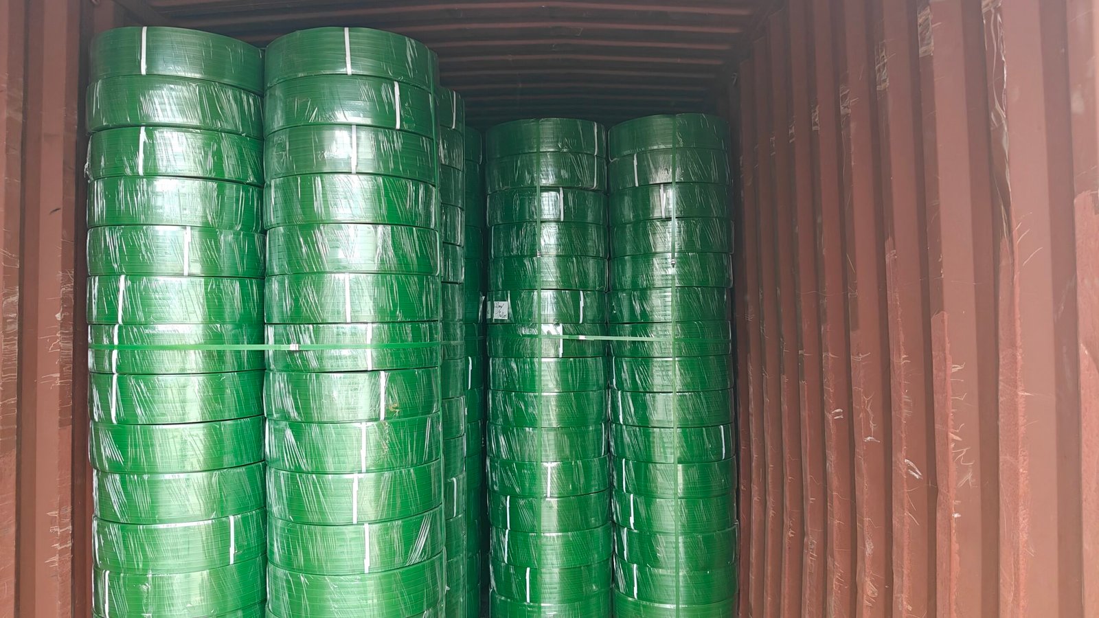 Green PET Packing Strap Loaded Into Container for Export Shipment
