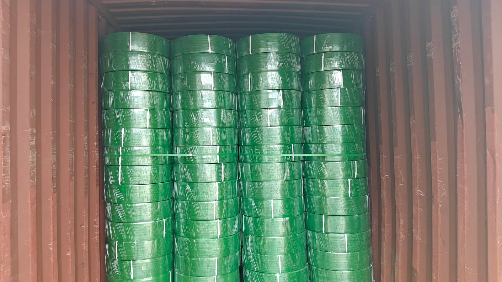 Green PET Packing Strap Loaded Into Container for Export Shipment
