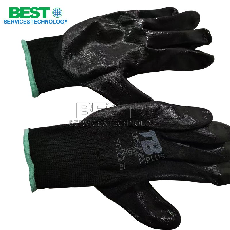 Protective gloves worn by workers in plywood veneer cutting and gluing workshop