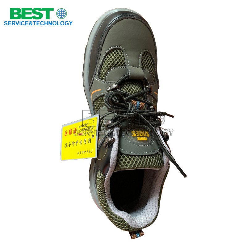Steel toe safety shoes worn by workers in plywood manufacturing workshop