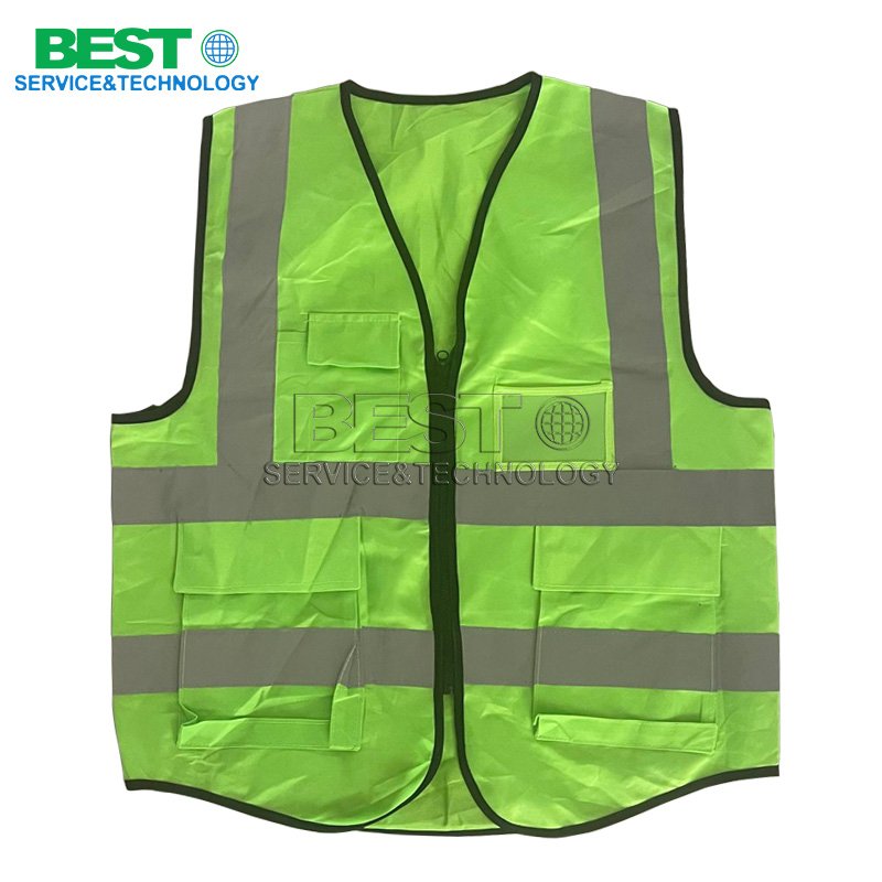 Workers wearing reflective vest in plywood production, loading and unloading area