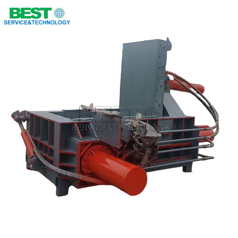 Industrial hydraulic baler system for compressing metal scrap into dense blocks