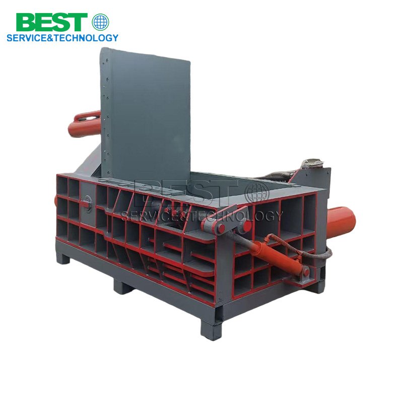 High-efficiency metal baler used in steel recycling and scrapyard operations