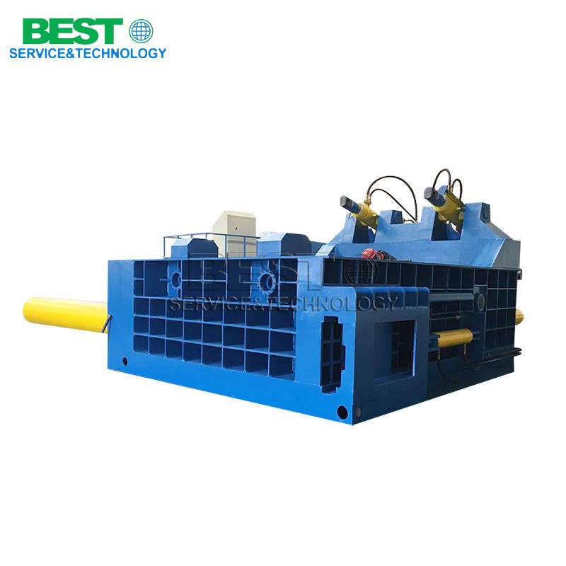 Industrial briquetting machine for compressing metal swarf and machining waste
